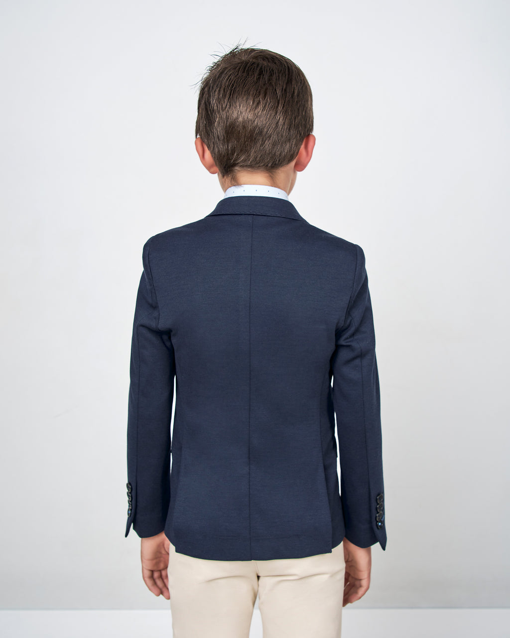 AMERICANA DE NIÑO PUNTO LISO AZUL MARINO